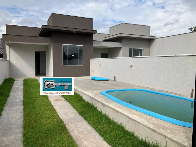 Casa com 3 dormitório